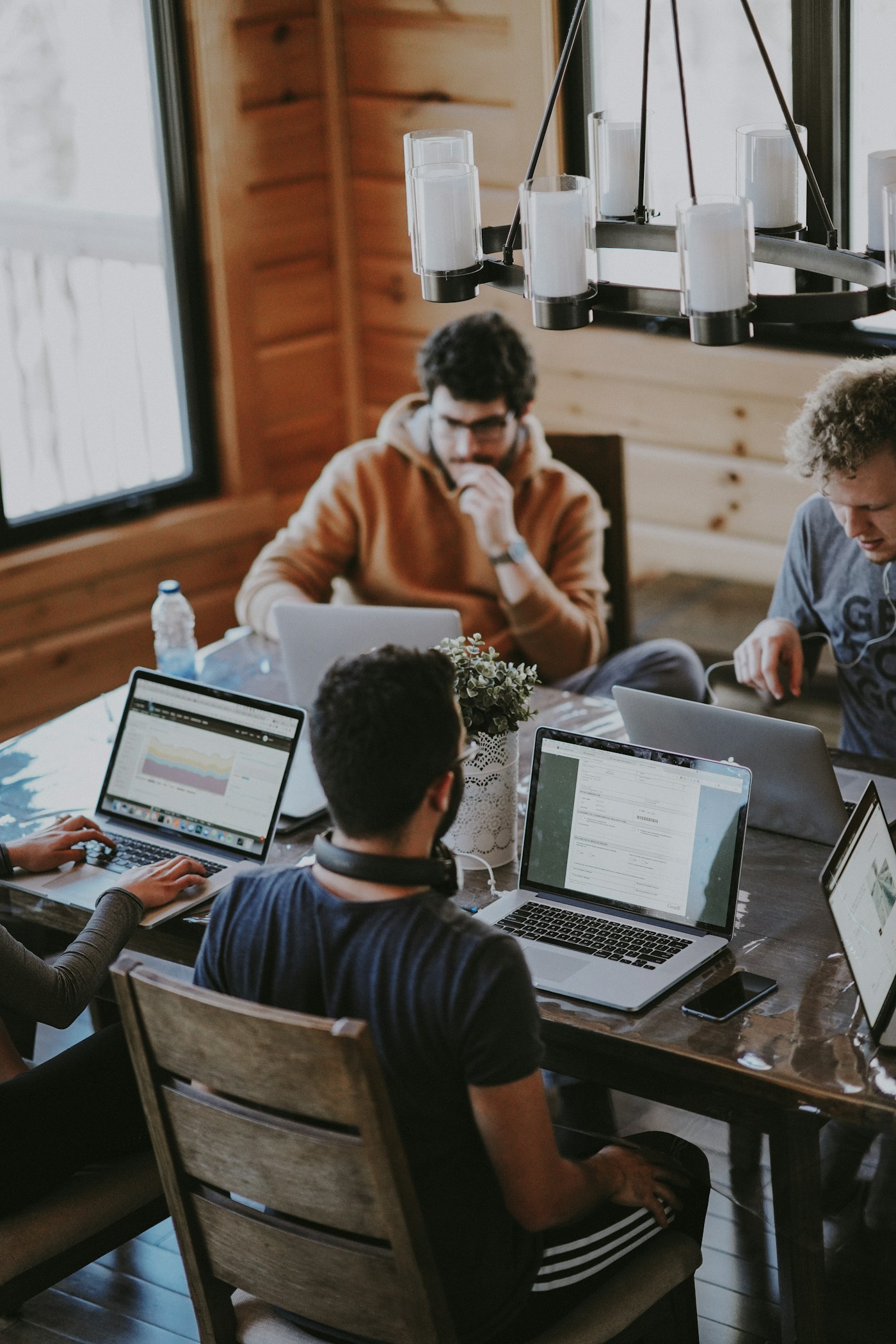 A small team collaborating in natural light